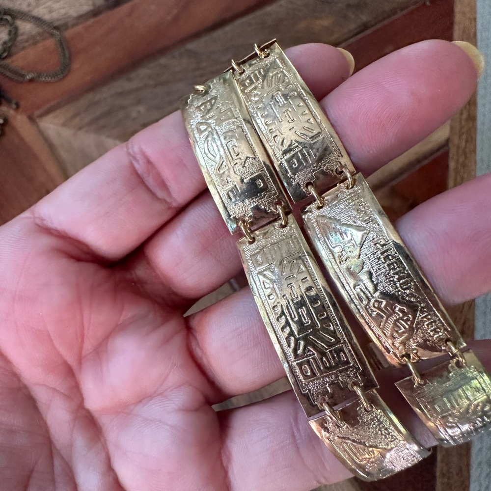 2 beautiful gold bracelets with Nepali symbols/motifs, purchased in Nepal